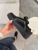Czarne sneakersy ze złotymi wstawkami